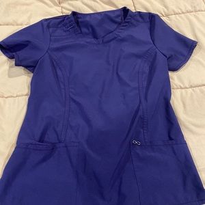 Purple Cherokee infinity scrub top no stains or holes. Size medium.